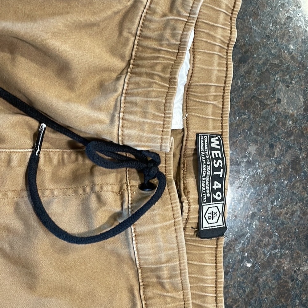 Like new condition. Lot includes 3 pairs of WEST 49 pant joggers. Son grew!